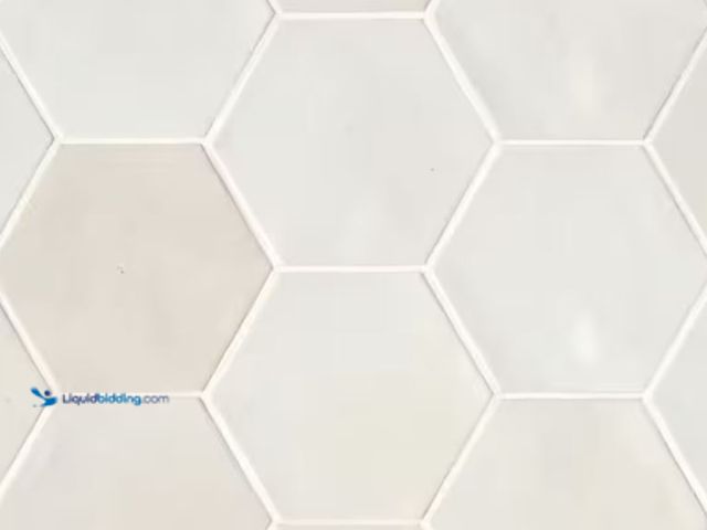 Lot 49-2026190 - Approx. (74) Sq. Ft. of Bedrosians Celine Hexagon 4 in. x 5 in. Glossy White Porcelain Floor Tile (4...