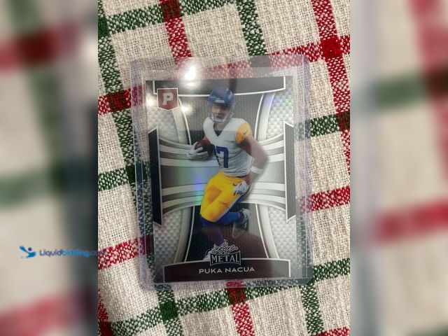 Lot 49-1505901 - COLLECTIBLE AMAZING LEAF METAL PUKA NACUA 1/1 PRE-PRODUCTION PROOF FOOTBALL CARD #COINS1211