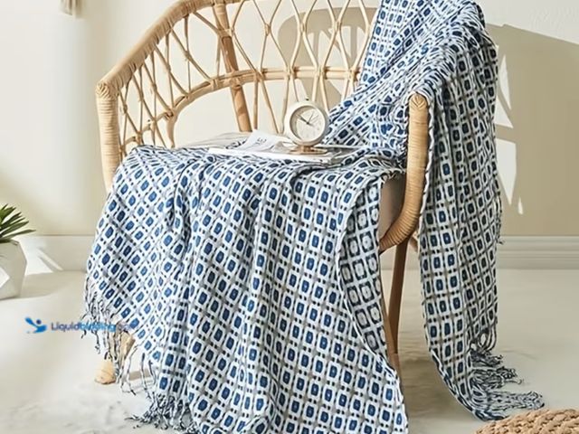 Lot 49-1975270 - Medium Weight Knit Throw Blanket. Medium blue, taupe, and white. Extra long 50”x70”. New unused in o...