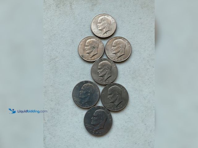 Lot 49-1804204 - 7 “IKE” EISENHOWER LARGE ONE DOLLAR COINS