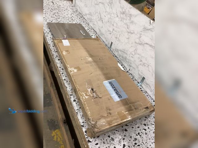 Lot 49-3531514 - Garvee Coffee Table (Rustic Grey) PHO_1488VZUS Item is used with shipping damage to the box