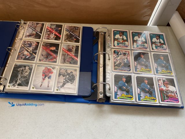 Lot 49-5341804 - LOT OF 2 BINDERS FULL OF SPORT CARDS FROM VARIOUS TYPES AND YEARS LOADED WITH STARS AND HALL OF FAME...