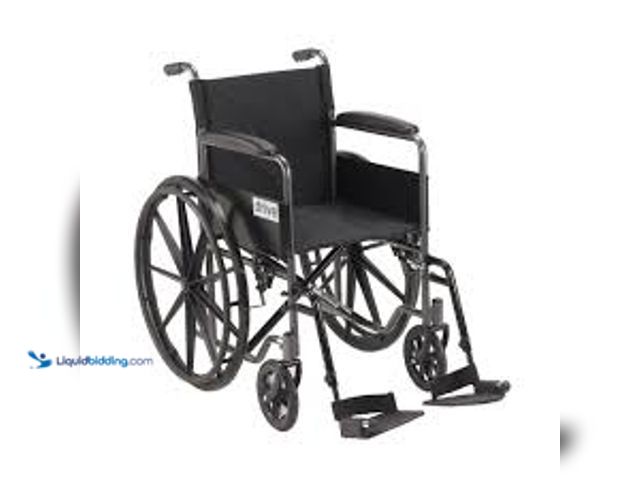 Lot 49-5476488 - Drive Medical Silver Sport 1 Wheelchair with Full Arms and Swing Away Removable Footrest. Model # SS...