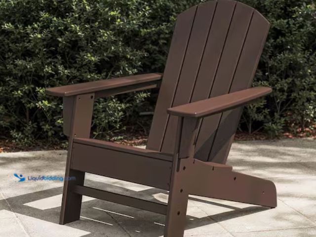 Lot 49-2020721 - POLYWOOD Seabrook Adirondack Chair in Mahogany, Model # OSA20-MA, Unused, Has attachments.  Ref#LBRe...