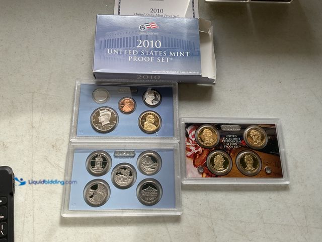 Lot 49-1830602 - 2010 UNITED STATES MINT PROOF SET 14 COINS IN HARD PLASTIC CASES AND ORIGINAL SLEEVE #COINS0219
