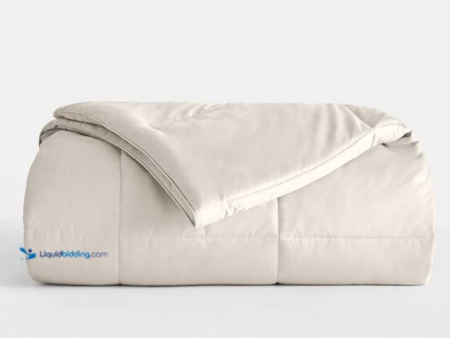 Lot 49-2020890 - Becky Cameron Performance Ivory Solid King Comforter, Model # IEH-COMF-KING-IV, New.  Ref#SR0918