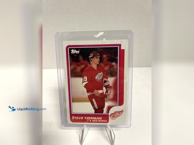 Lot 49-910518 - 1990-91 Topps Steve Yzerman #240 – Detroit Red Wings Featuring Hall of Famer Steve Yzerman during hi...