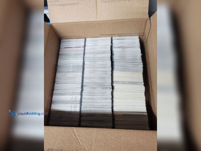 Lot 49-1988940 - BOX OF AROUND 2,000 COLLECTIBLE SPORTS CARDS.