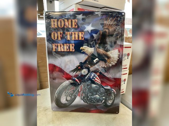 Lot 49-5451511 - Other NEW METAL COLLECTOR SIGN “HOME OF THE FREE” MEASURES APPROXIMATELY 12 INCH BY 16 INCH
