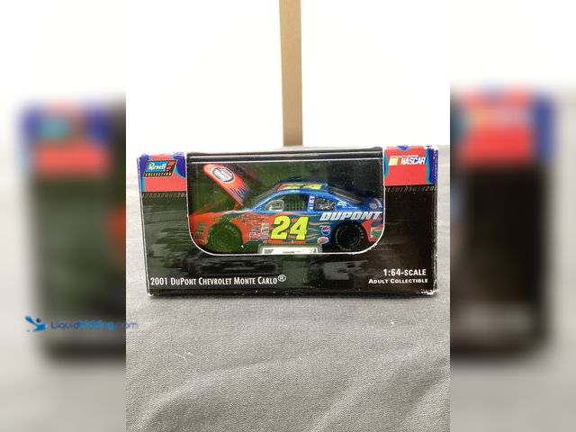 Lot 49-910647 - New Other Revell Collection 2001 Jeff Gordon #24 DuPont Chevrolet Monte Carlo Die Cast Car Adult Col...