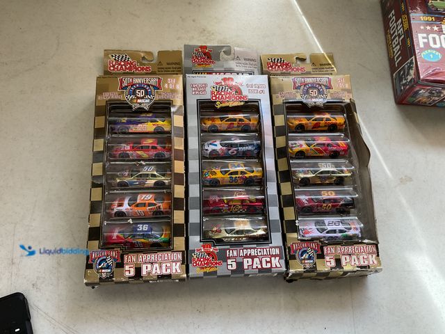 Lot 49-1830762 - COLLECTIBLE LOT OF 3 RACING CHAMPIONS 1/64 SCALE DIECAST 5 PACK CARS NASCAR FAN APPRECIATION ORIGINA...