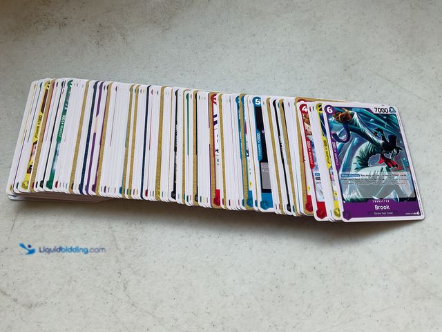 Lot 49-1804628 - 100+ ONE PIECE COLLECTIBLE CARDS.