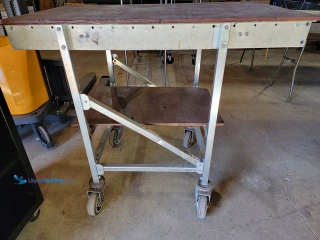 Lot 49-1816010 - welding cart, which is a mobile table used to hold welding equipment. While the specific model is no...