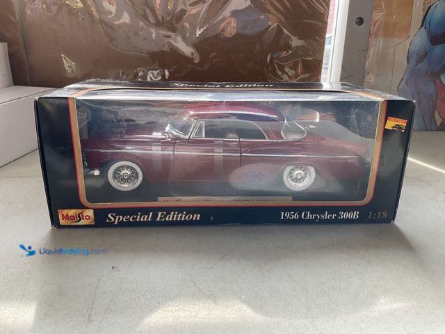 Lot 49-1830741 - COLLECTIBLE MAISTO SPECIAL EDITION 1/18 SCALE DIECAST CAR IN ORIGINAL BOX 1956 CHRYSLER 300B #COINS0...
