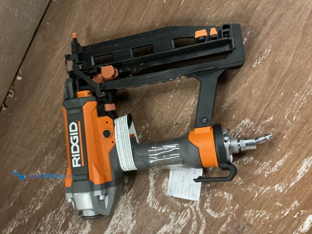 Lot 49-5572039 - RIDGID 16-Gauge 2-1/2 in. Professional T64 Pneumatic Oil-Free Straight Finish Nailer with Dry Fire P...