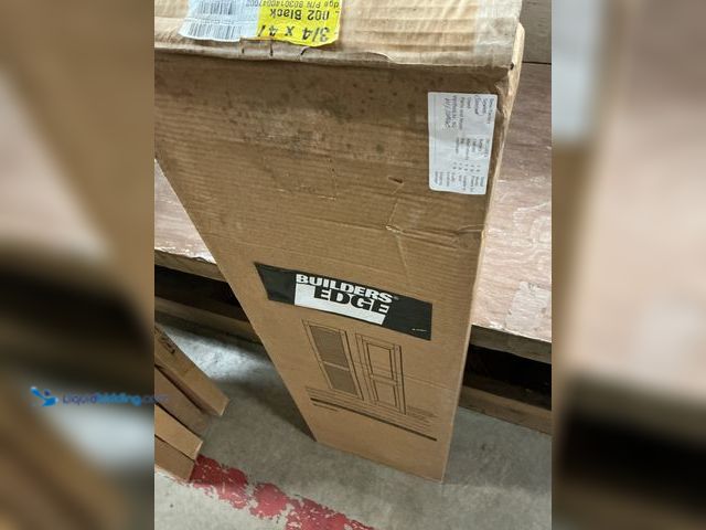 Lot 49-3540024 - Builders Edge Raised Panel Vinyl Shutter 15" x 51" - Black (box damage) (scuffs and scratches) Unuse...