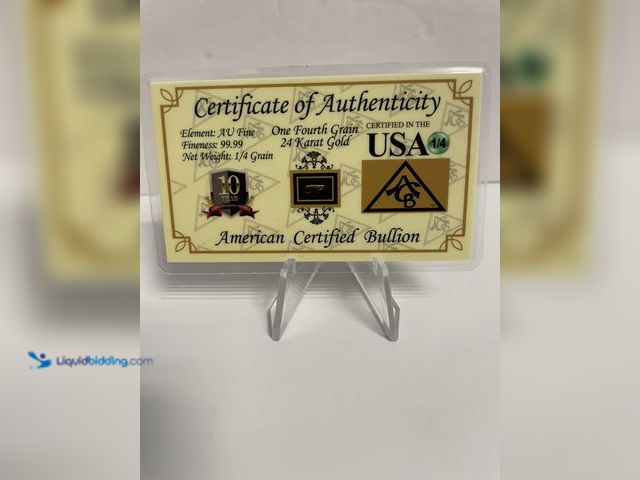 Lot 49-910389 - American Certified Bullion .25gr 24K Gold bar card featuring .9999 fine gold and Certificate of Auth...