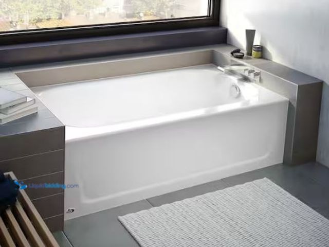 Lot 49-1569765 - Bootz Industries Maui 60 in. x 30 in. Alcove Soaking Bathtub with Right Drain in White, Model # 011-...