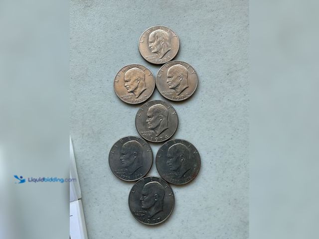 Lot 49-1804203 - 7 “IKE” EISENHOWER ONE DOLLAR COINS