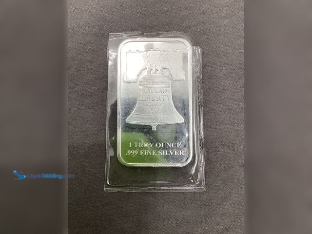 Lot 49-910823 - New SD Bullion one troy ounce .999 fine silver bar featuring a liberty Bell design.