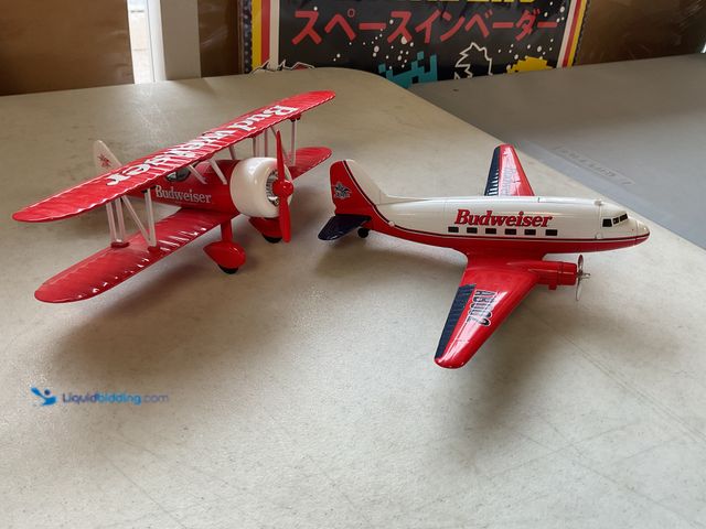 Lot 49-1505762 - COLLECTIBLE LOT OF 2 LIBERTY CLASSICS LIMITED EDITION BUDWEISER COLLECTIBLE DIECAST BANK AIRPLANES N...