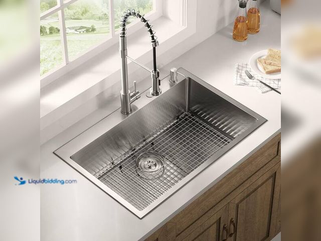 Lot 49-5454025 - SERENE VALLEY
24.17 in. x 13.11 in. Rear Drain Heavy-Duty Stainless Steel Sink Grid. Item is Unused