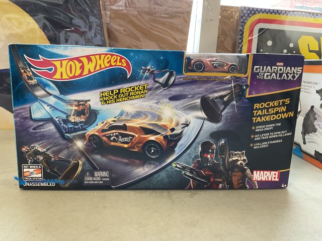 Lot 49-1505783 - COLLECTIBLE HOT WHEELS GUARDIANS OF THE GALAXY ROCKET’S TAILSPIN TAKEDOWN 1/64 SCALE CAR AND TRACK N...