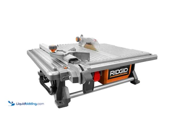 Lot 49-1566855 - RIDGID 6.5-Amp 7 in. Blade Corded Table Top Wet Tile Saw, Model # R4021, Unused, Power on, Has attac...