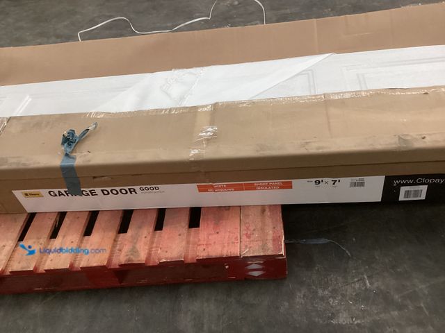 Lot 49-5486451 - Clopay 3 Layer Insulated Garage Door (White) Item is unused with scuffs to corners