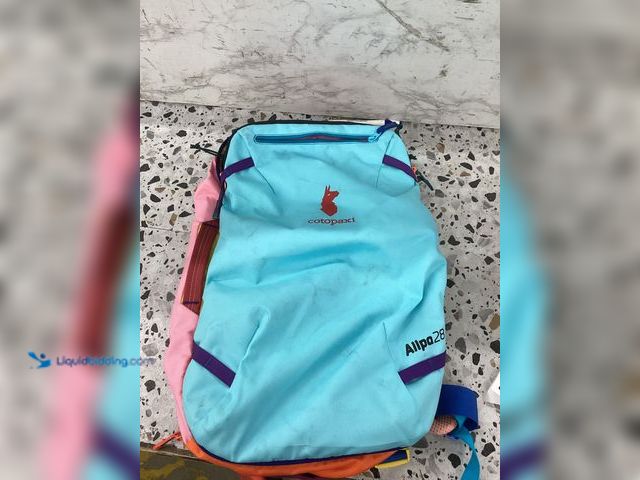 Lot 49-3528159 - Cotopaxi Allpa 28 Travel Pack. Item is used and dirty.