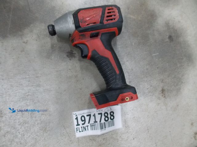 Lot 49-1971788 - 1 Milwaukee NV 18 Volt Drill Milwaukee M18 18 Volt Drill Used In Rough Condition Does Have Alot Of W...