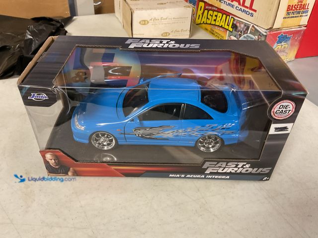 Lot 49-1814839 - COLLECTIBLE JADA FAST and FURIOUS MIA’S ACURA INTEGRA 1/24 SCALE DIECAST CAR IN ORIGINAL BOX #COINS1...