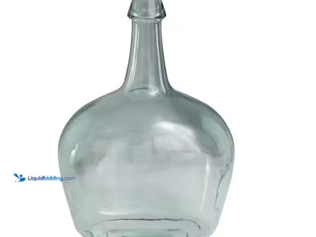Lot 49-1622666 - Litton Lane 15 in. Clear Handmade Spanish Bottle Neck Recycled Glass Decorative Vase, Model # 043465...