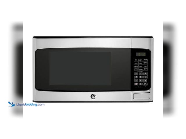 Lot 49-5476397 - GE
1.1 Cu. Ft. Capacity Countertop Microwave Oven. Item is Unused