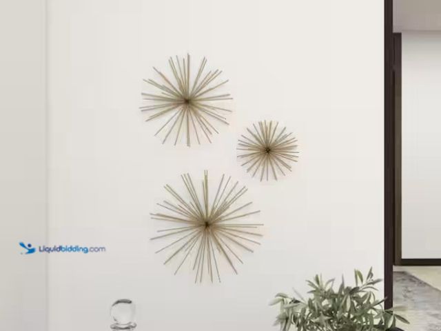 Lot 49-1575369 - Litton Lane Metal Gold 3D Starburst Wall Decor (Set of 3), Model # 50387, Unused.  Ref#ASRHD0130