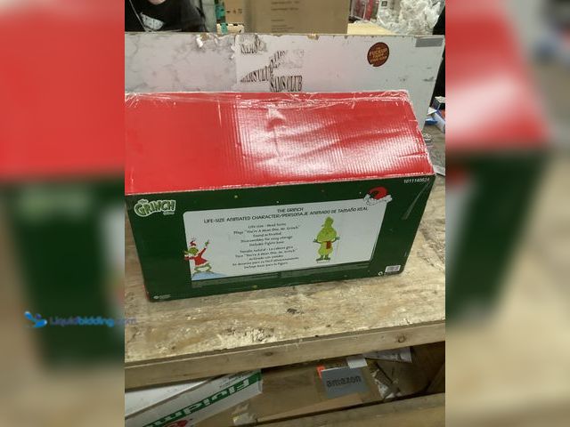 Lot 49-5454200 - 4Ft Dr.Seuss life size grinch. Item unused.