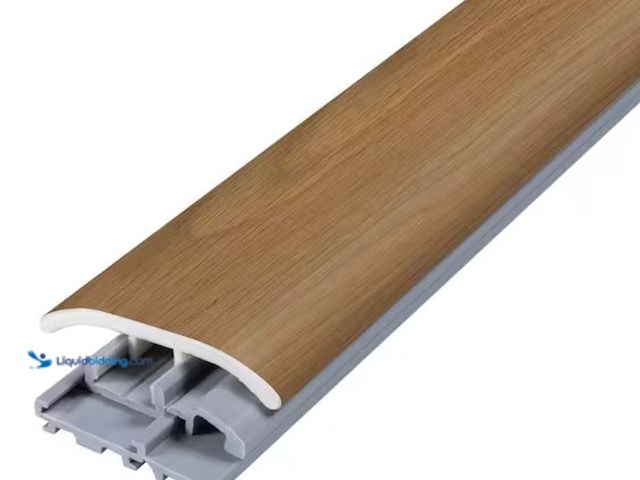 Lot 49-3639373 - Vinyl Trim 4-in-1 Molding Strip (0.31 in. T x 2 in. W x 78.7 in. L) Model: V4N1H-05331, Slightly Use...
