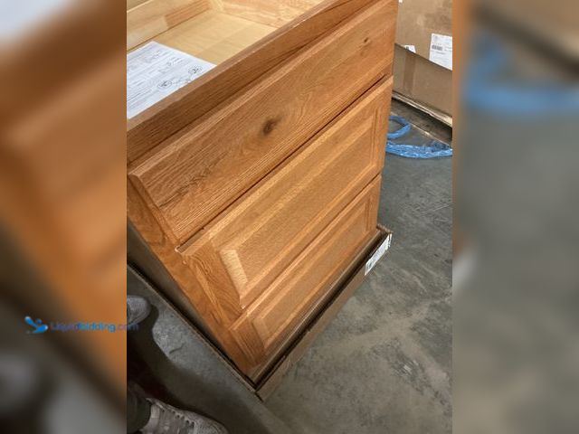 Lot 49-5484640 - Hampton Bay 24in. W X 34.5in. H X 24in. D Hampton Raised Panel Drawer Base Cabinet With 3 Drawers, M...