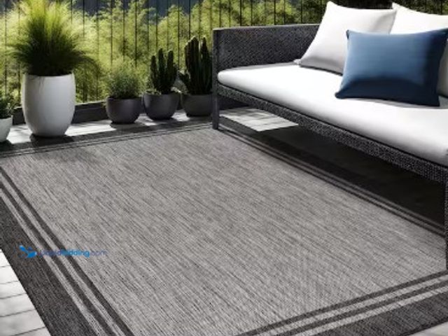 Lot 49-2025699 - Beverly Rug 9 X 12 Silver Pebble Aloha Washable Bordered Indoor Outdoor Area Rug, Model # HD-ALH6026...