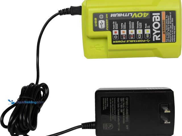 Lot 49-5452648 - Ryobi OP404 Lithium-ion 40 Volt Battery Charger. Item is used, powers on.