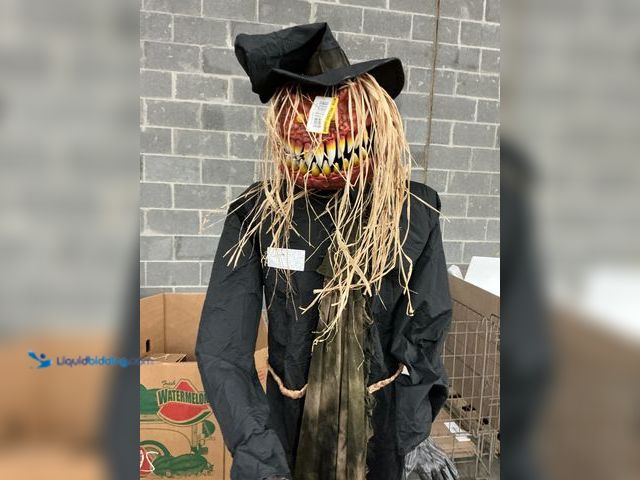 Lot 49-5572028 - Home Accents Holiday 7 FT Grave & Bones Animated LED Guardian of the Gourds. Model # 25PA02750. NO C...