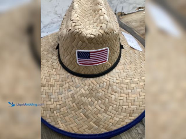 Lot 49-5436882 - Qty 2. Straw hat with American flag on fron and on the underside. Unused.