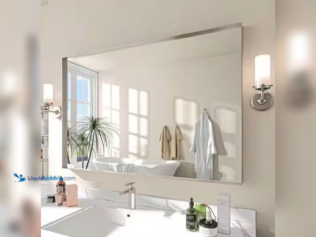 Lot 49-2006172 - TOOLKISS 48 in. W x 32 in. H Rectangular Aluminum Framed Wall Bathroom Vanity Mirror in Silver, Mode...