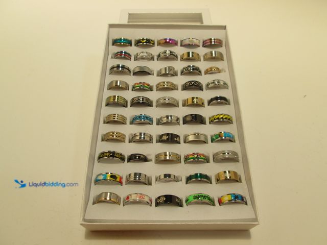 Lot 49-5393253 - Bulk Lot of 50 Stainless Steel Rings in Retail Display Box - NEW - Includes Men's and Women's Sizes/...