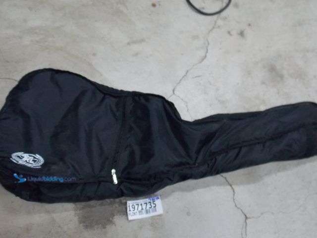Lot 49-1971735 - 1 TKL NV Soft Guitar Case  TKL Soft Guitar Case Used In Fair Condition, Does Have Some Ware And Tear...