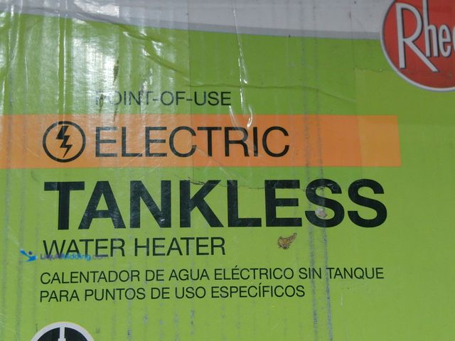 Lot 49-2024933 - Rheem Performance 8 kW 1.55 GPM 240-Volt Self-Modulating Electric Tankless Water Heater. Model # RET...