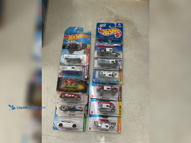Lot 49-5467375 - Other LOT OF 12 NEW HOT WHEELS 1/64 SCALE DIECAST CARS IN ORIGINAL PACKAGES VARIOUS MAKES AND MODELS