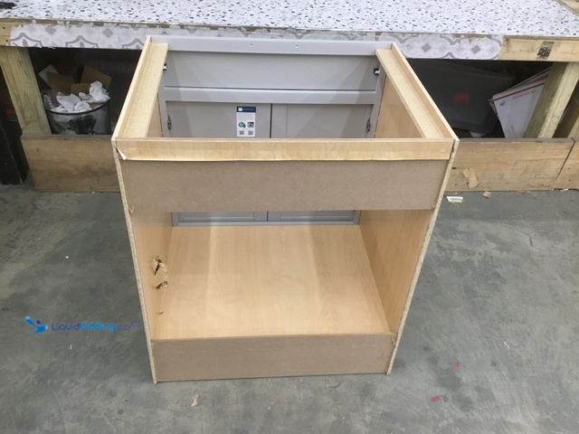 Lot 49-5410818 - Grat Bathroom Vanity without Sinktop. Approx 30" x 24" x 34 1/2" Unused. Dent in the side.