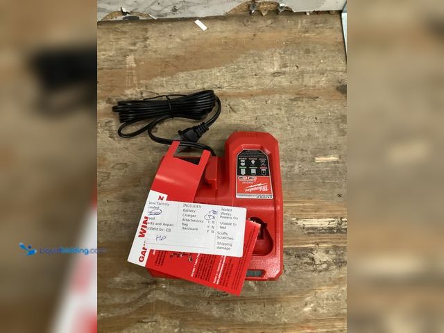 Lot 49-5436929 - Milwaukee M12 and M18 12-Volt/18-Volt Lithium-Ion Multi-Voltage Rapid Battery Charger. Model # 48-59...