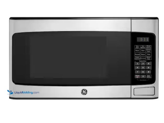 Lot 49-3611961 - GE 1.1 Cu. Ft. Capacity Countertop Microwave Oven, Model # GCST11N1WSS, Slightly used, Scuffs/Scratc...